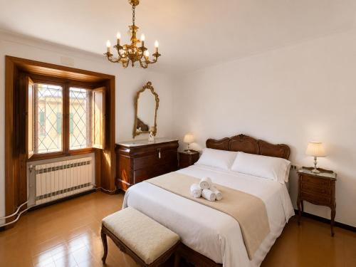 a bedroom with a bed with two teddy bears on it at Sa Torre - Casa Mallorquina con encanto in Campos