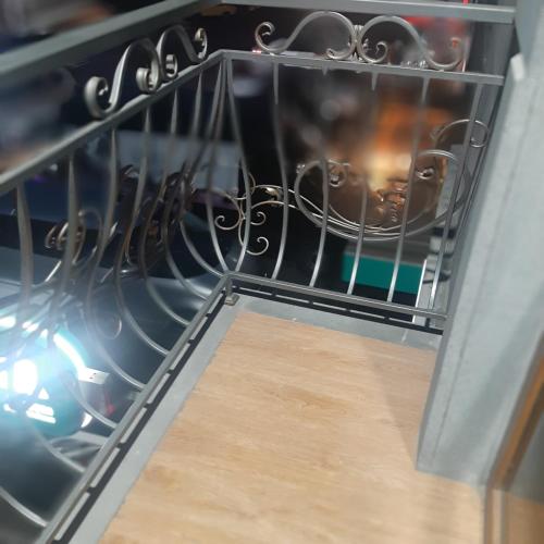 a dish rack in an oven filled with utensils at Noy in Goris