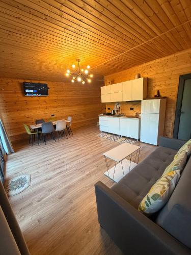 a living room with a couch and a table at NorWay1 in Ijevan