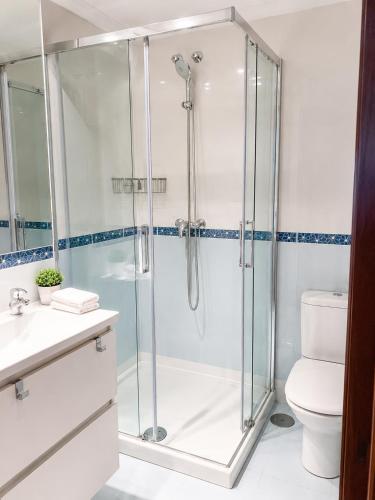 O baie la Atico céntrico con piscina comunitaria
