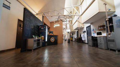 a large room with a large blackboard on the wall at La Joya Hostel in Valparaíso