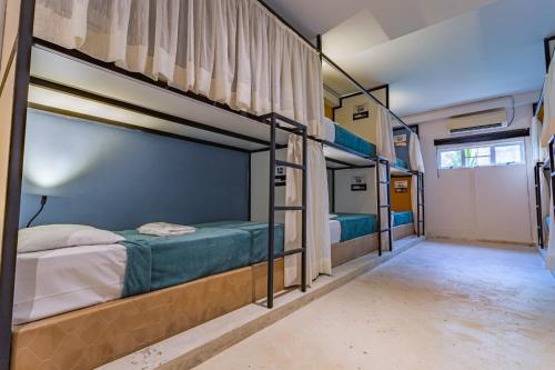 a group of bunk beds in a room at URB Hotel in Fortaleza