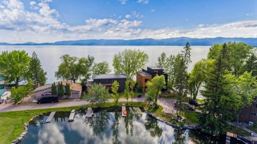 an aerial view of a house on a lake at Rivers End Lake House in Bigfork