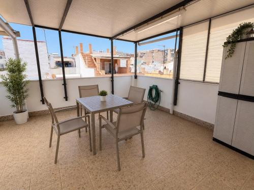 Casa Adosada con Terraza, Solárium y Vistas al Mar