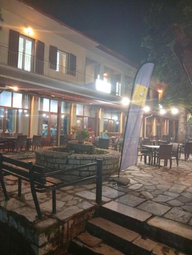 a restaurant at night with a sign in front of it at FANTINO HOTEL in Domnista