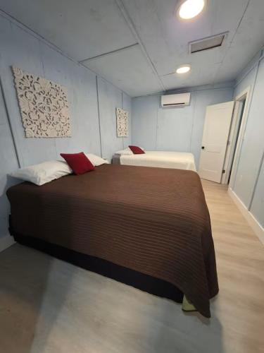 a bedroom with two beds in a room at River Run Bo's Place in Kerrville