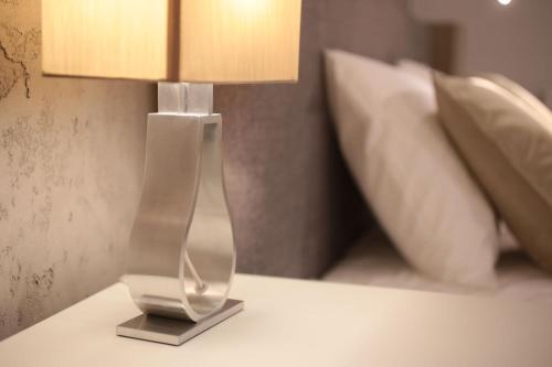 Ένα ή περισσότερα κρεβάτια σε δωμάτιο στο Super-Apartamenty VIP