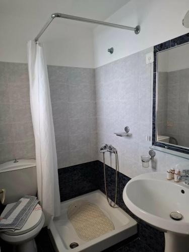 a bathroom with a toilet and a sink at 9 Muses in Elafonisos