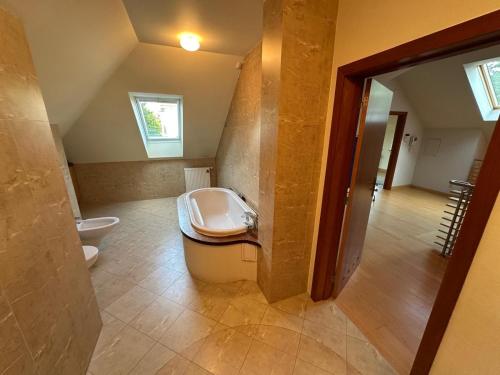 a bathroom with a toilet and a sink at Anna Maria in Łomianki
