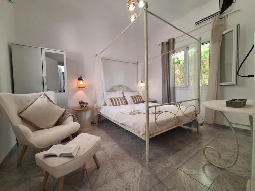 Llit o llits en una habitació de Vithos