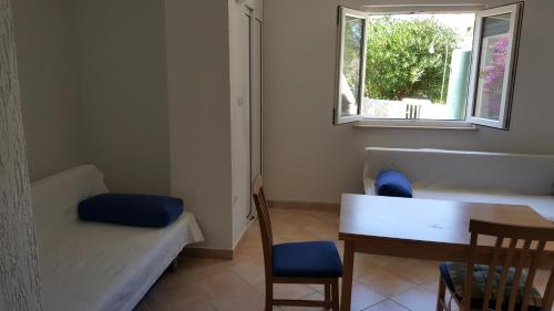 Postel nebo postele na pokoji v ubytování Studio Apartment Bosko