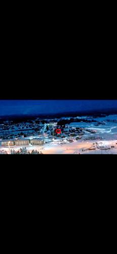an aerial view of a city with a red car at HimosKukkula, 140m2 in Jämsä