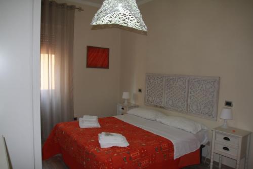 เตียงในห้องที่ Profumi di mare Resort