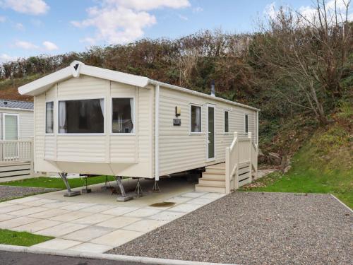 a white trailer parked in a driveway at Acorn 1 - Ukc8213 in Pendine