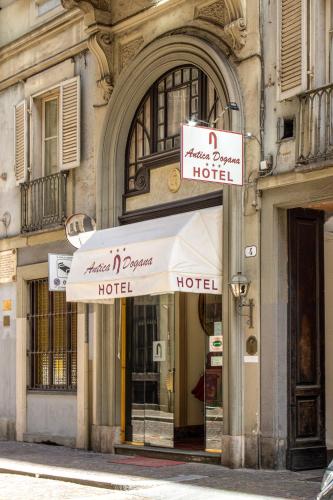 a hotel sign on the front of a building at Hotel Antica Dogana in Turin