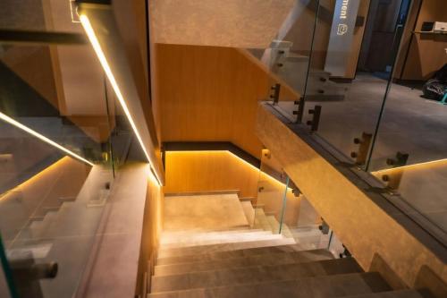 an overhead view of stairs in a building at Blue Boat Aparthotel in Mamaia Sat/Năvodari