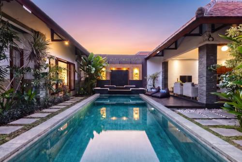an image of a swimming pool in a house at Lapiz Lazuli in Seminyak