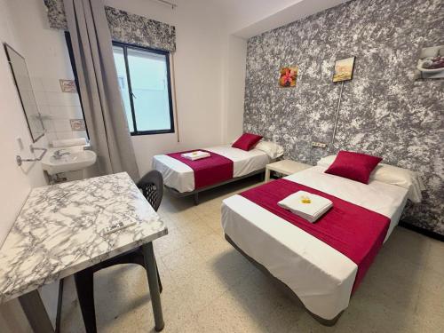Evans Realty - Hostal