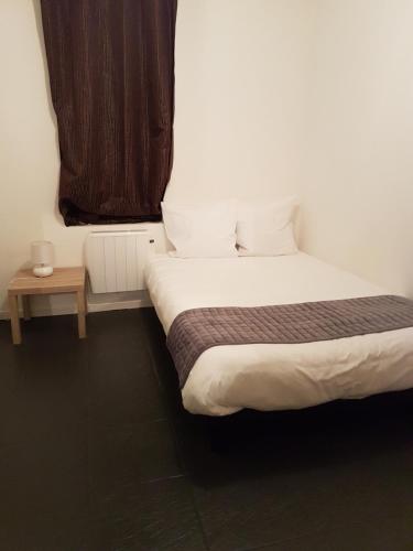 Hotel Morezにあるベッド