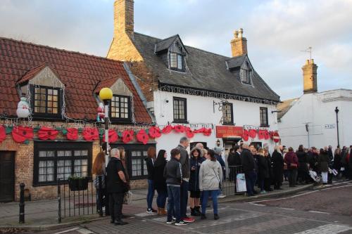 a group of people standing outside of a building at Cross Keys Hotel Chatteris in Chatteris
