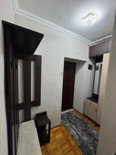 a room with a hallway with a door and a room with at Avenue B&B in Vanadzor