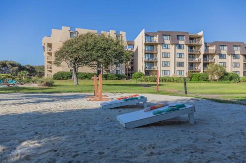 Spacious villa with pool hot tub playground & cute decor - steps from beach photo 32