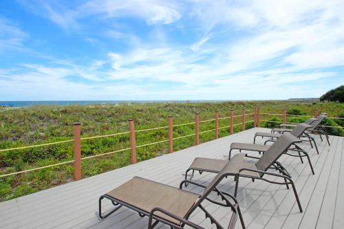 Spacious villa with pool hot tub playground & cute decor - steps from beach photo 35