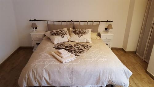 Een bed of bedden in een kamer bij B&B CA'SUANA