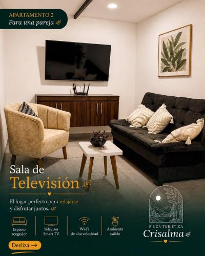 a living room with a couch and a table at crisalma 1 in La Tebaida
