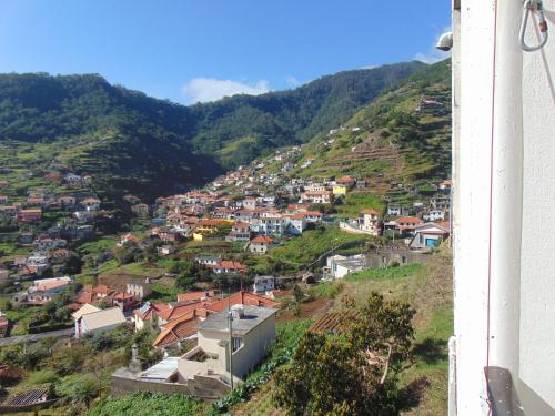 a view of a town on a mountain at Marques House in Machico