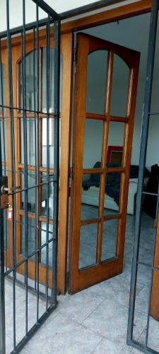 an open door to a room with glass at Avellaneda in Mendoza