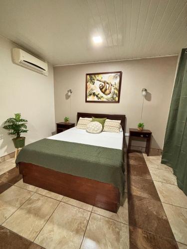 a bedroom with a large bed in a room at Apartamento Aura 10 in El Coco