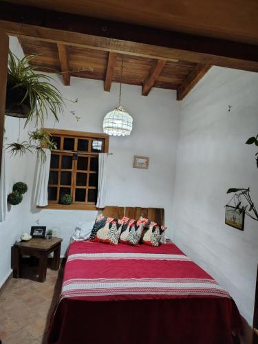 a bedroom with a large bed in a room at Glamp de Lujo Teques Granja El Sol in Xoxocotla
