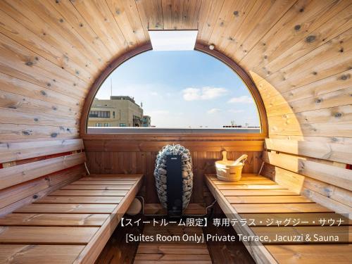 an inside of a sauna with a window at LACER OKINAWA NAHA Miebashi in Naha