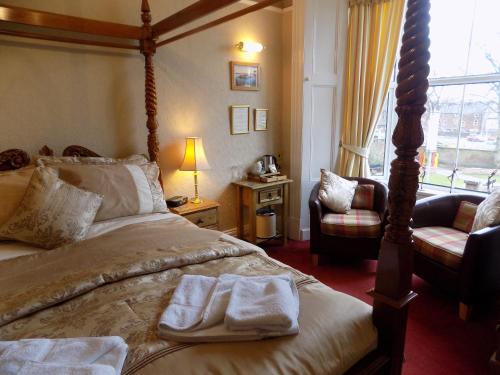 Ένα ή περισσότερα κρεβάτια σε δωμάτιο στο Glendale Guest House