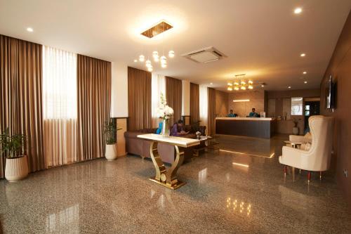 a lobby of a hospital with a waiting room at Clickon Value Seven Hills in Chik Bānavar