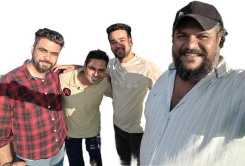 a group of men standing next to each other at Himjoy farm in Dādo Sība