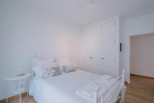 Een bed of bedden in een kamer bij Casa do Jardim