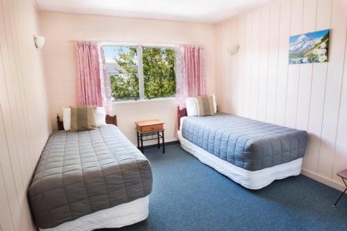 Katil atau katil-katil dalam bilik di Union Victoria Motel