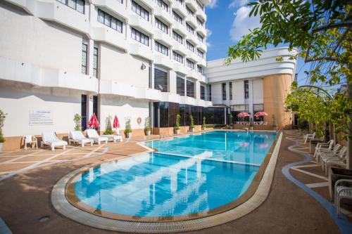 The swimming pool at or close to Seeharaj Hotel