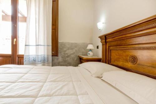 Llit o llits en una habitació de Hotel Sa Suergia