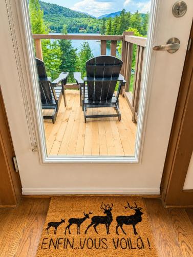 a view from the front door of an emtn views room at Appartement-Condo sur Lac Superieur-Mont-Tremblant in Lac-Superieur