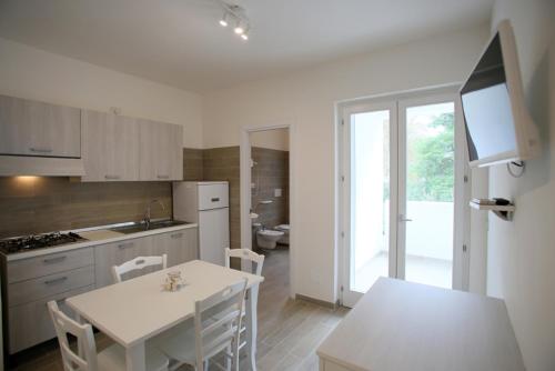 A kitchen or kitchenette at Residence Rendez Vous