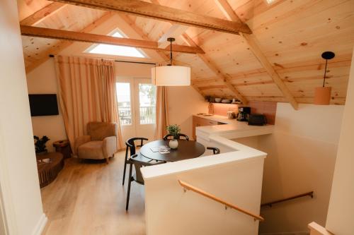 a kitchen with a table in a room at The Mill House in Bayfield
