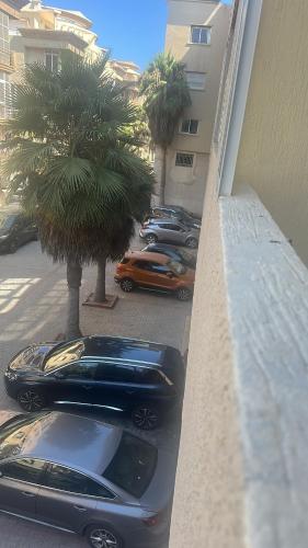 a row of cars parked next to a building at Stodio sofia in Essaouira
