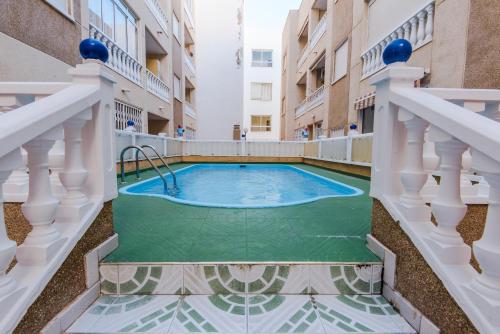 a hot tub on the balcony of a building at Casas Holiday - Playa del Cura in Torrevieja