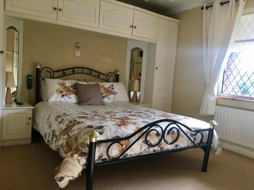 Katil atau katil-katil dalam bilik di Plantation Lodge