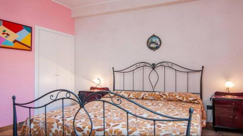 Ένα ή περισσότερα κρεβάτια σε δωμάτιο στο Casa indipendente con ampia veranda