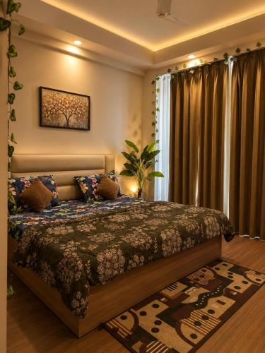 a bedroom with a bed in a room at The Sky cabin in Greater Noida