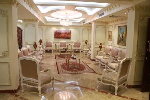 a large room with a bunch of chairs in it at The Guard Hotel in Cairo